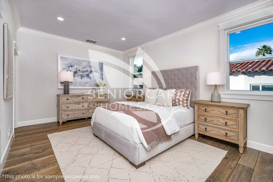 A clean, modern bedroom an Assisted Living Facility