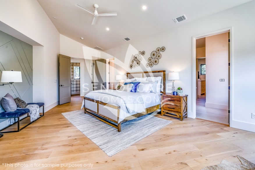 A bright beautiful private bedroom in a senior living care home