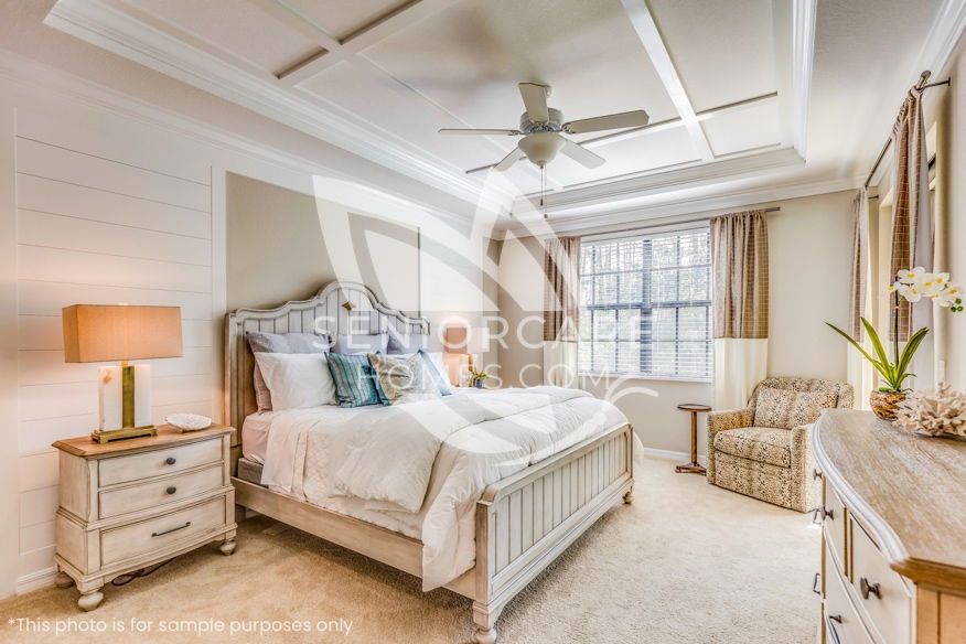 A beautifully decorated private bedroom in an Assisted Living Care Home